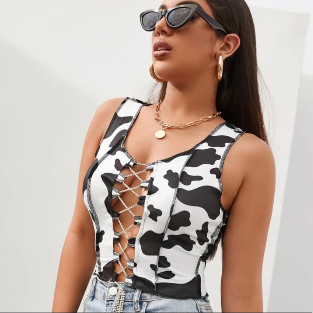 Cow print lace up top